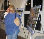 Attendees study the image boards